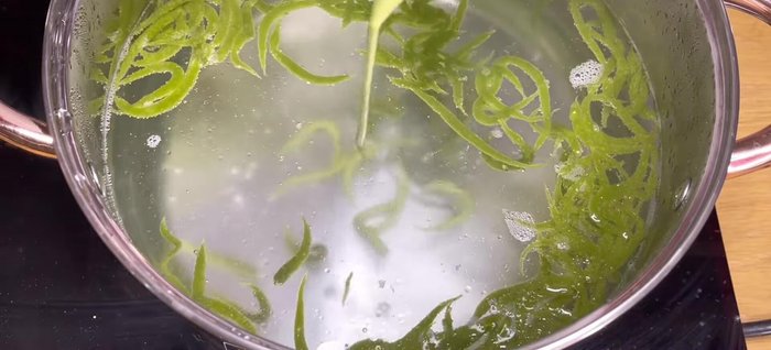 Immediately transfer the cooked Banh Lot to a bowl of ice water to cool and firm up.