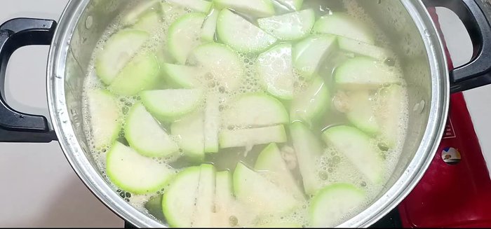 Once boiling, reduce heat to low and continue to skim off foam.