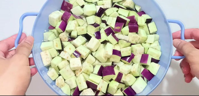 Soak eggplants for 5 minutes, flipping halfway.