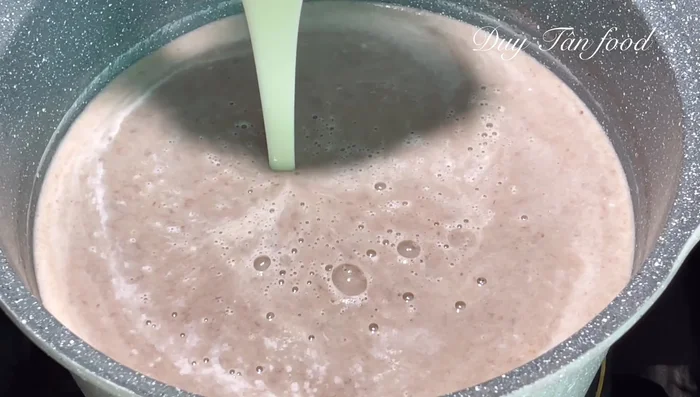 Combine and simmer: Combine blended red beans, rock sugar, condensed milk, salt, and remaining fresh milk in a pot. Simmer on low heat until hot, stirring regularly.
