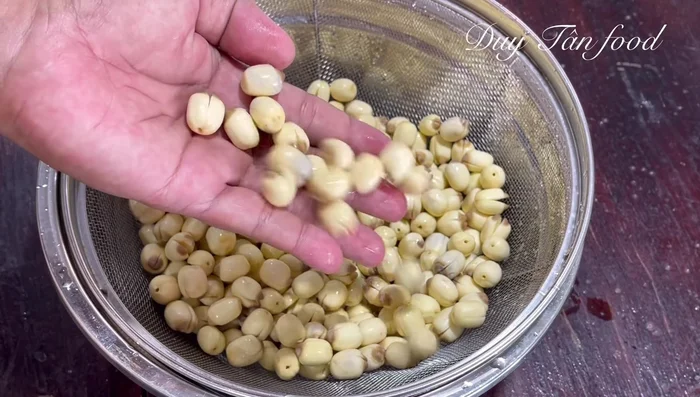 Prepare lotus seeds: Remove the lotus heart from each seed. Rinse and set aside.