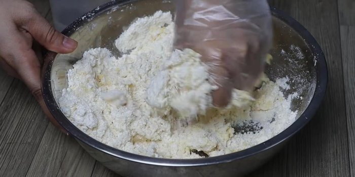 Combine all ingredients, ensuring sugar dissolves. Rest the dough in a covered container to let it rise.