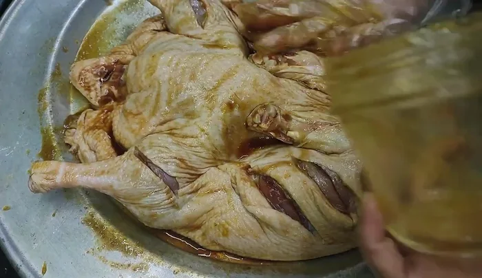 Rub the remaining lemongrass and garlic on the duck.