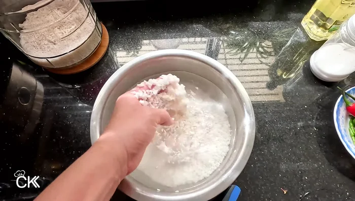 Rinse the soaked rice thoroughly and drain.