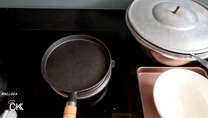 Heat oil in a non-stick or cast iron pan over high heat.