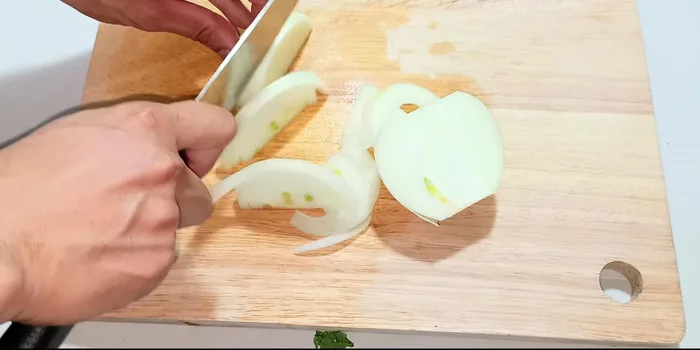 Prepare herbs: Chop Vietnamese coriander and herbs finely.