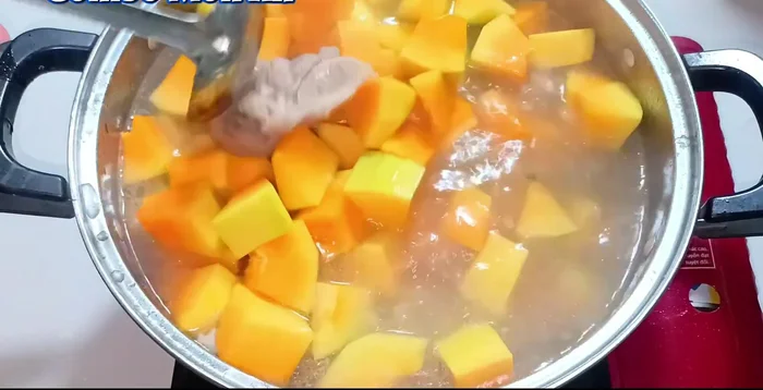 Add the papaya to the pot. Simmer for 10-15 minutes, or until tender.