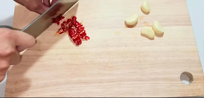 Chop garlic and chili. Adjust chili amount based on preference.
