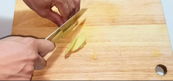Peel, wash, and thinly slice the ginger.