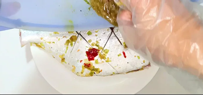 Steam the fish: Place the marinated pomfret on a plate, pour remaining marinade over it, and steam over boiling water for 15 minutes.