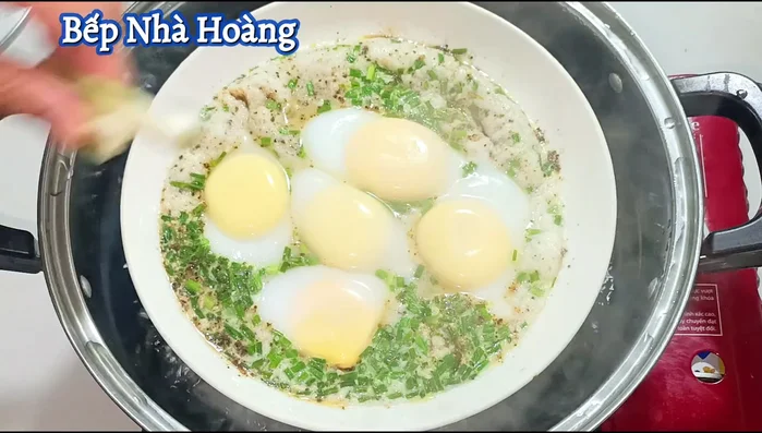 After 3 minutes of steaming, add the remaining green onions and soy sauce.
