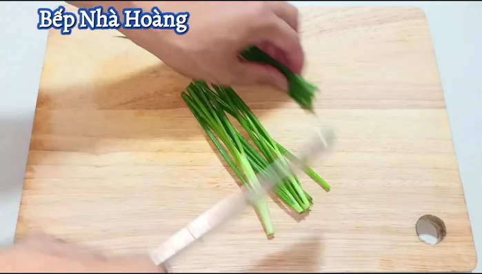 Prepare the green onions: Chop the green onion heads separately. Finely chop the green onion stems.