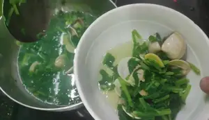 Delicious Clam Soup with Mustard Greens - Simple Vietnamese Recipe