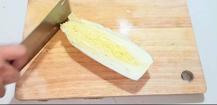 Cut the cabbage into pieces, similar thickness to the carrots.