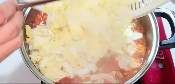 Add the cabbage, stir well, and cover to cook until boiling again.