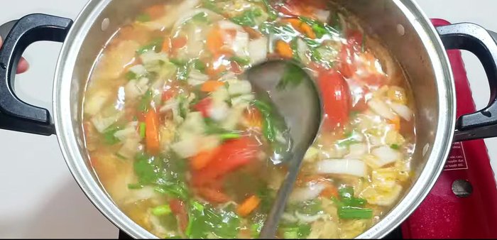 Add chopped green onions and cilantro, stir well.