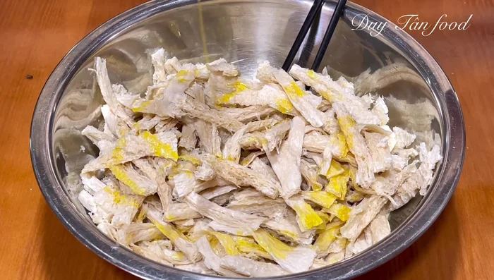 In the same pan with remaining oil (about 2 tablespoons), add vegetarian spare ribs, vegetarian seasoning, and the fried lemongrass mixture. Mix well.