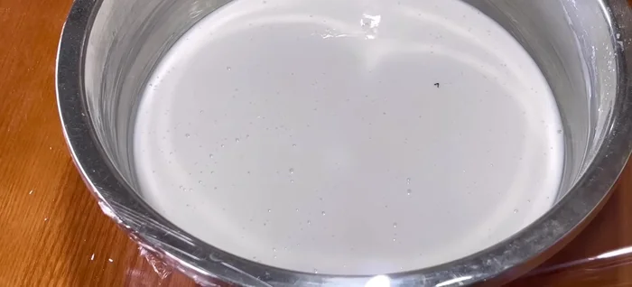 Cover the bowl with plastic wrap and let the batter rise at room temperature for 90-120 minutes, or until doubled in size.