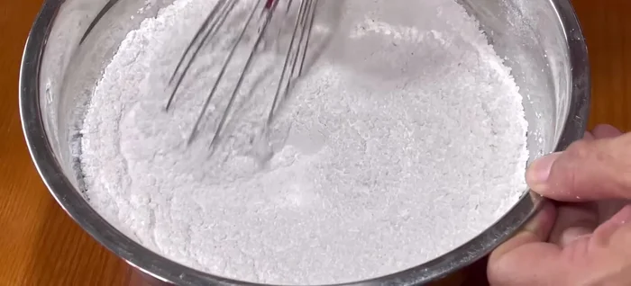 Combine rice flour, wheat flour, sugar, yeast, and salt in a bowl. Mix well.