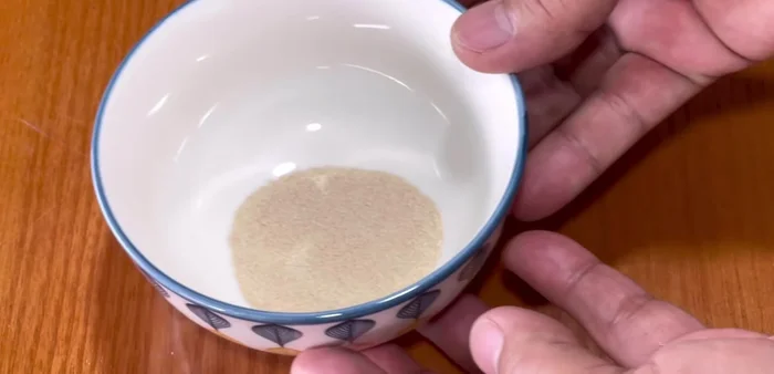 Activate yeast: In a bowl, combine dry yeast, 2 teaspoons of sugar, and a small amount of warm water. Let it sit for 5 minutes until it foams.