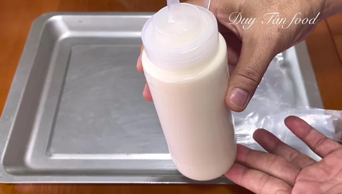 Transfer yogurt into bags or containers. Add fruits if desired. Seal bags tightly.