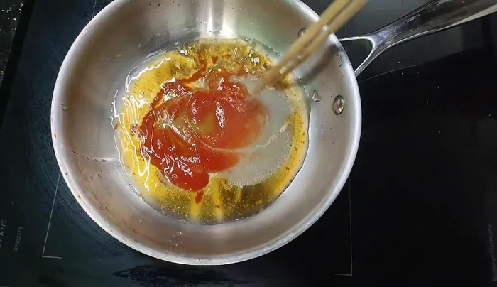 Prepare the sauce: Mix water, chili sauce, sugar, fish sauce, and vinegar. Blend well.