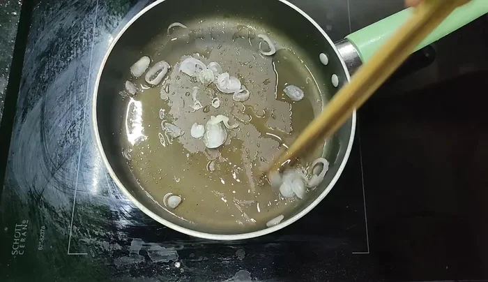 Add tomatoes to the pot.
