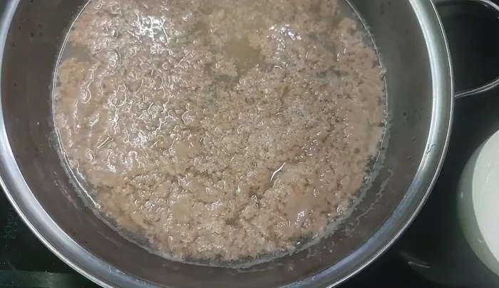 Let the crab fat boil slowly without stirring.