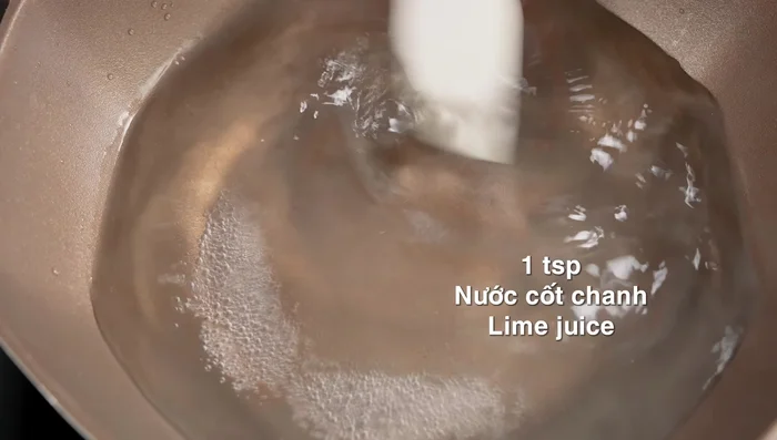 Blanch the potatoes in boiling water with a little lemon juice for about 1 minute. Drain and pat dry completely.
