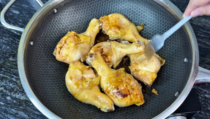 Prick the chicken thighs with a fork and pour remaining marinade over the chicken.