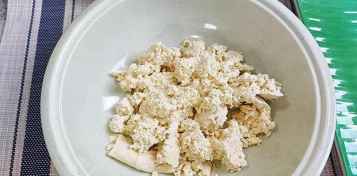 Squeeze the tofu to remove excess water. If using overnight tofu, boil it first.