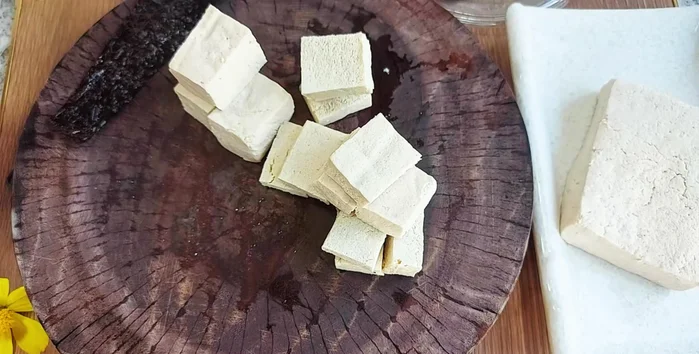 Wrap each tofu piece with a seaweed sheet.