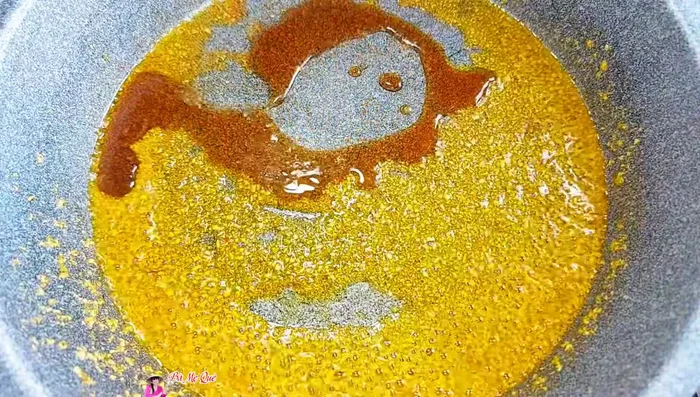 Add vegetarian fish sauce, sugar, and vegetarian seasoning. Stir to dissolve.