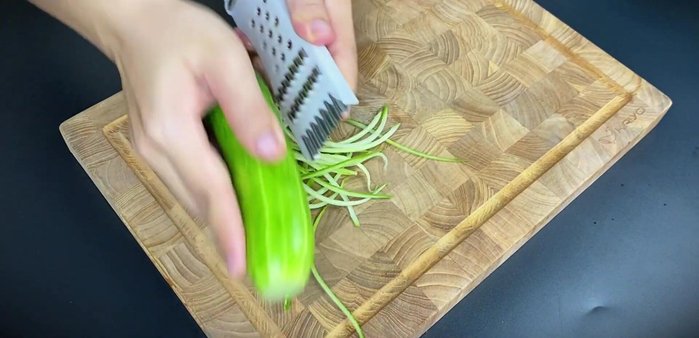 Prepare vegetables: Slice cucumbers, lettuce, and herbs.