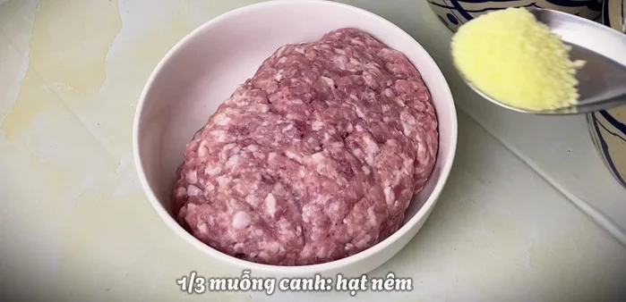 In a bowl, combine the ground meat, chopped onions (reserve some for garnish), seasoning powder, and oyster sauce. Mix well and let it marinate for at least 15 minutes (refrigerate for best results).