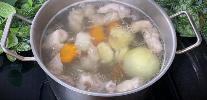 Add the lotus root to the broth and simmer until soft.