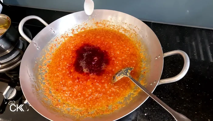 Stir in the annatto oil, 1/2 teaspoon of salt. Turn off heat. Stir well and let cool completely.