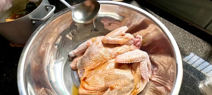 Marinate the chicken: Pour the cooled sauce over the chicken (148.319). Marinate for 1-1.5 hours, refrigerated (150.28). Wrap in plastic wrap to maintain freshness (167.239).