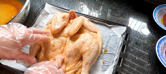 Bake the chicken: Preheat oven to 150°C (186.48). Bake for 20 minutes to dry the chicken and render fat (188).
