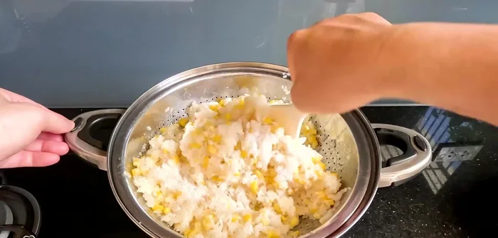 Mix well, then steam without the lid to let the excess moisture evaporate.