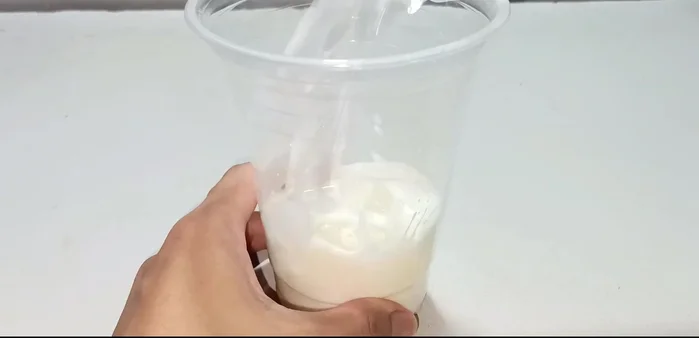 Fill the glass with ice.