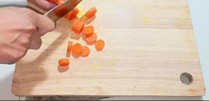 Peel and chop carrots, white radish, and onion.