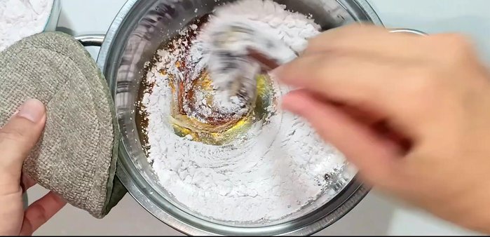 Remove from heat and gradually add the cocoa-tapioca starch mixture, mixing thoroughly until a dough forms.