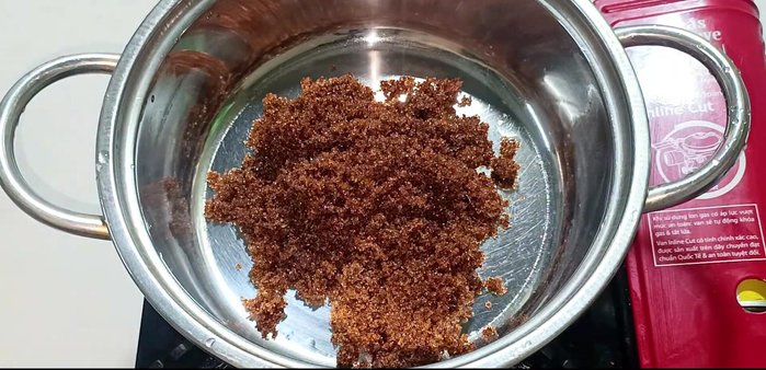 Prepare the sugar syrup: Cook 150ml water and remaining brown sugar on medium heat until dissolved and slightly thickened.
