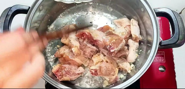 Add the marinated chicken and stir until cooked.