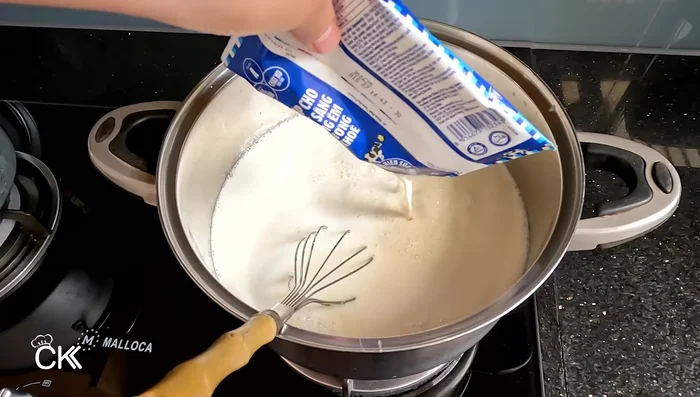 Add fresh milk and milk powder mixture to the boiled condensed milk. Cook until boiling. Remove from heat and let it cool down to 35-40°C.