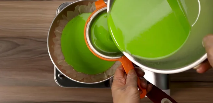 Pour the batter into the prepared pan, spreading evenly.