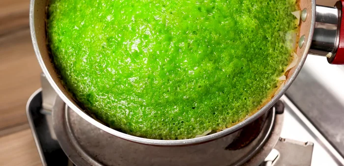 Check if the cake is done by inserting a toothpick in the center. It should come out clean.