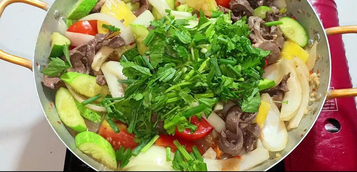 Add celery and green onions, stir-fry until cooked.