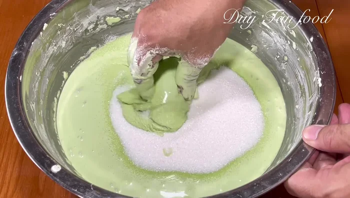 Add sugar: Add 320g sugar and stir until dissolved. Beat the dough for another 10-15 minutes (or 4-5 minutes with an egg beater).